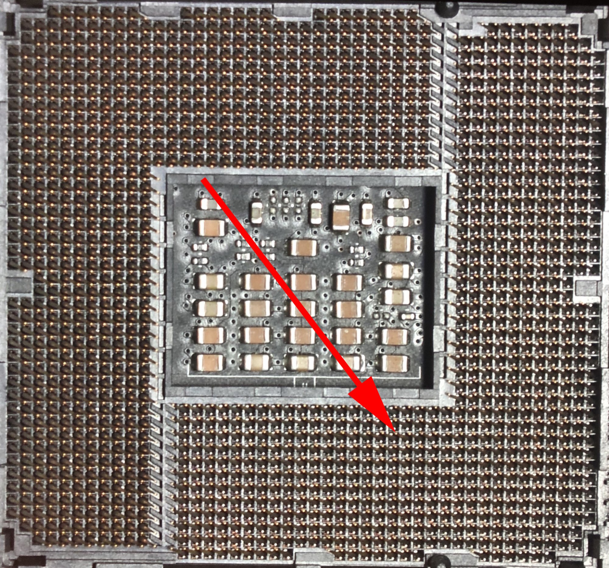 CPU B socket before bent pin repair arrow.jpeg