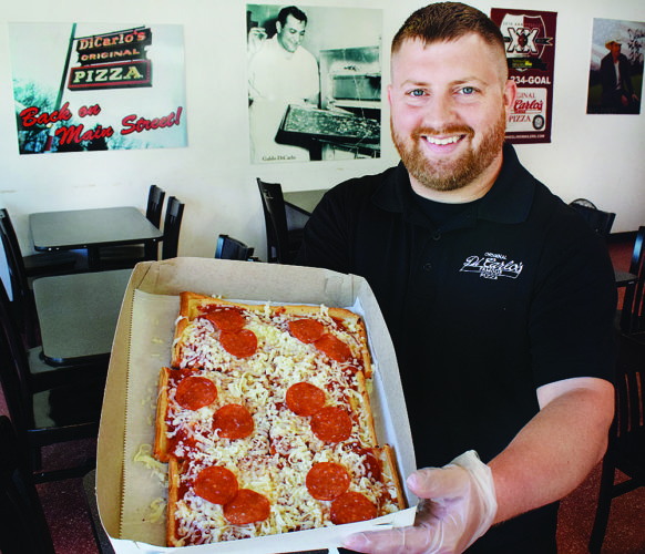 DiCarlos-Pizza-582x500.jpg