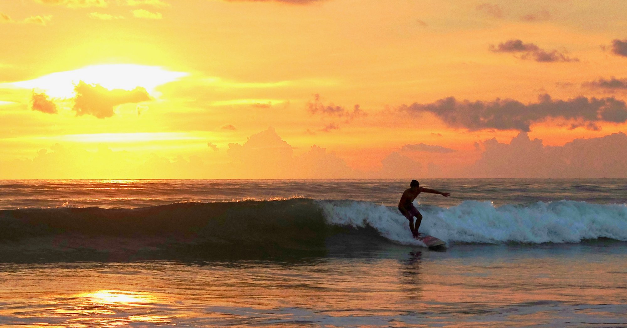 Evening surfer at Pakarang Beach, Phang Nga. Photo by Miichael Way – Version 2.jpg