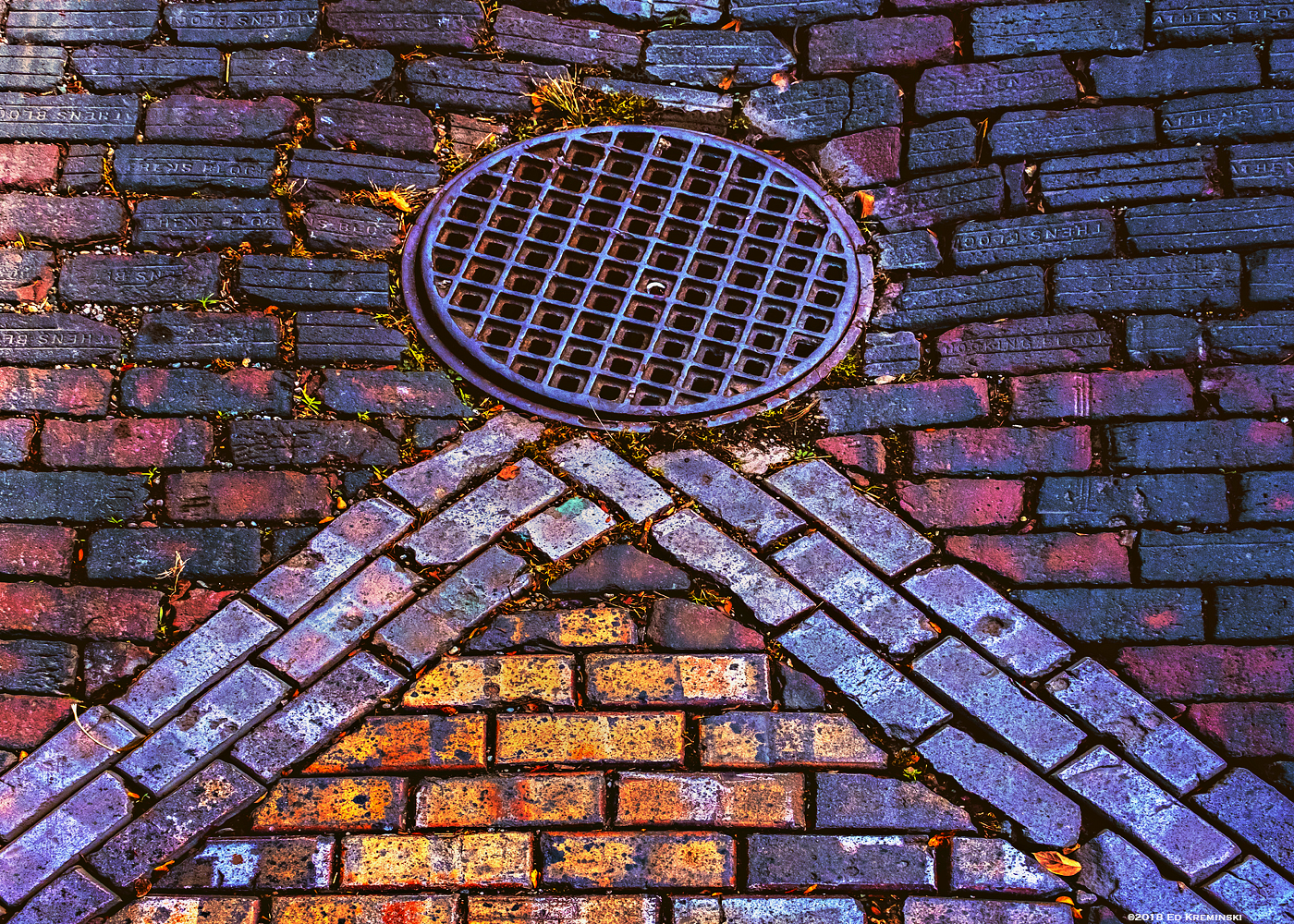 FallUnevenBrickStreetStormDrain.jpg