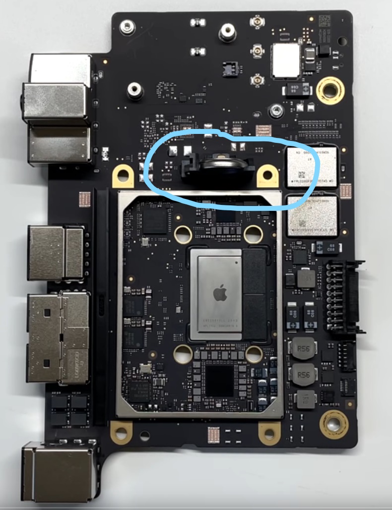 M1 Mac mini logic board with battery.jpg