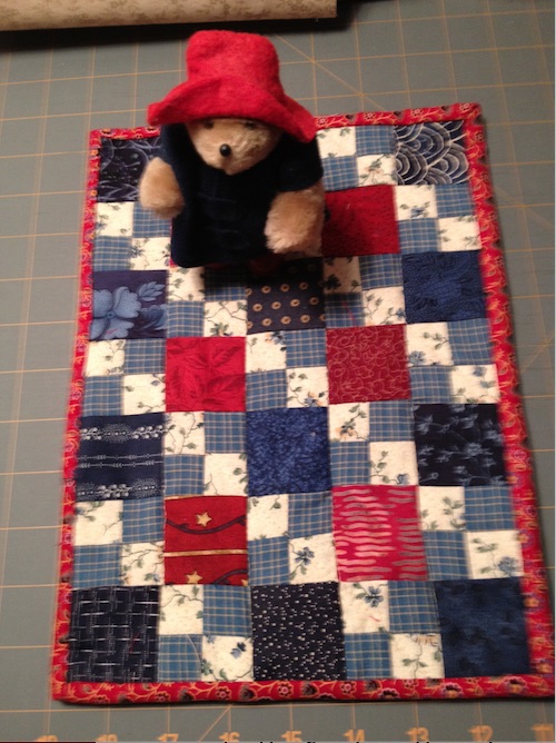 Paddington Bear checks out quilt.jpg