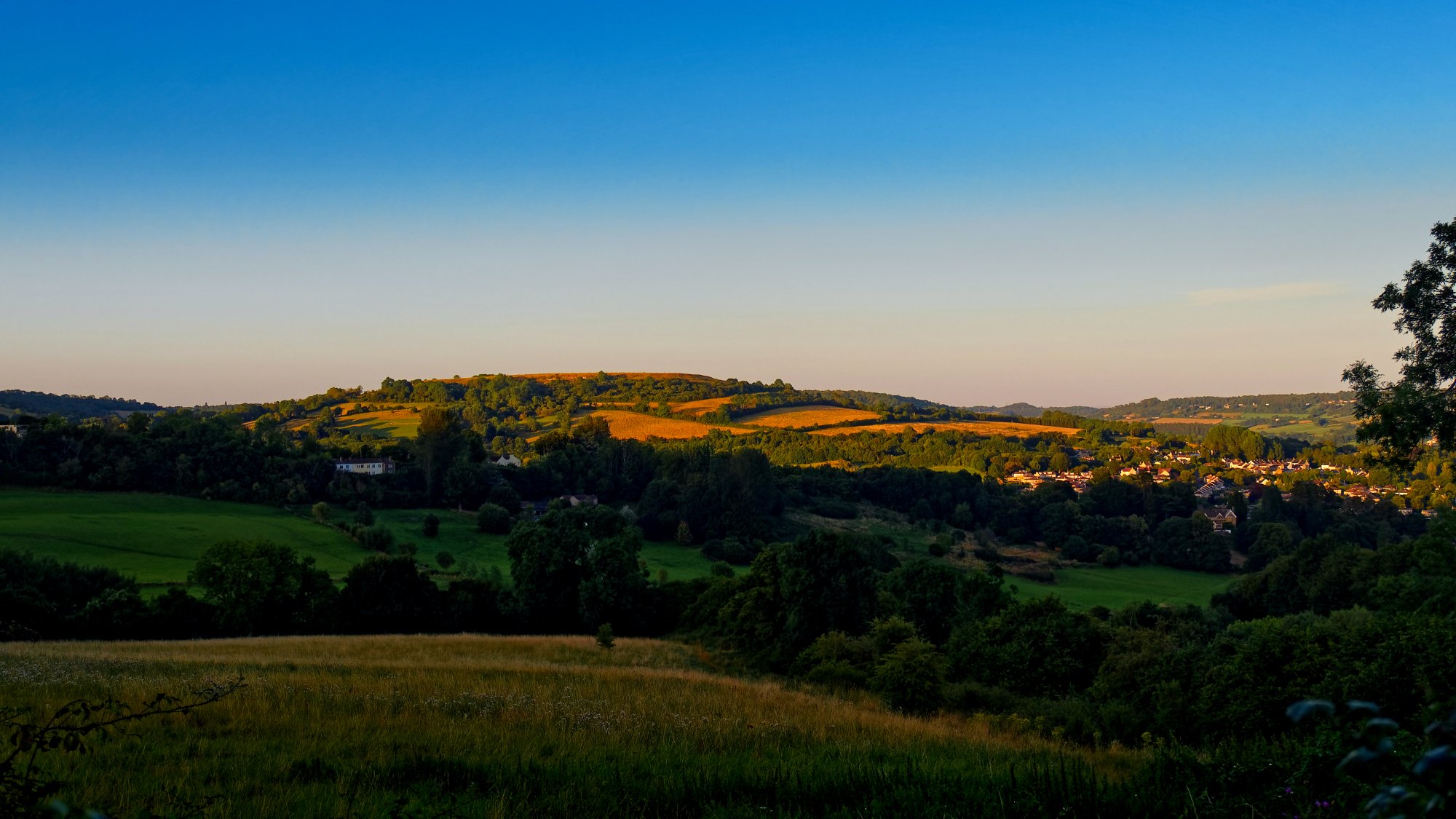 Solisbury Hill in the evening sun.jpeg