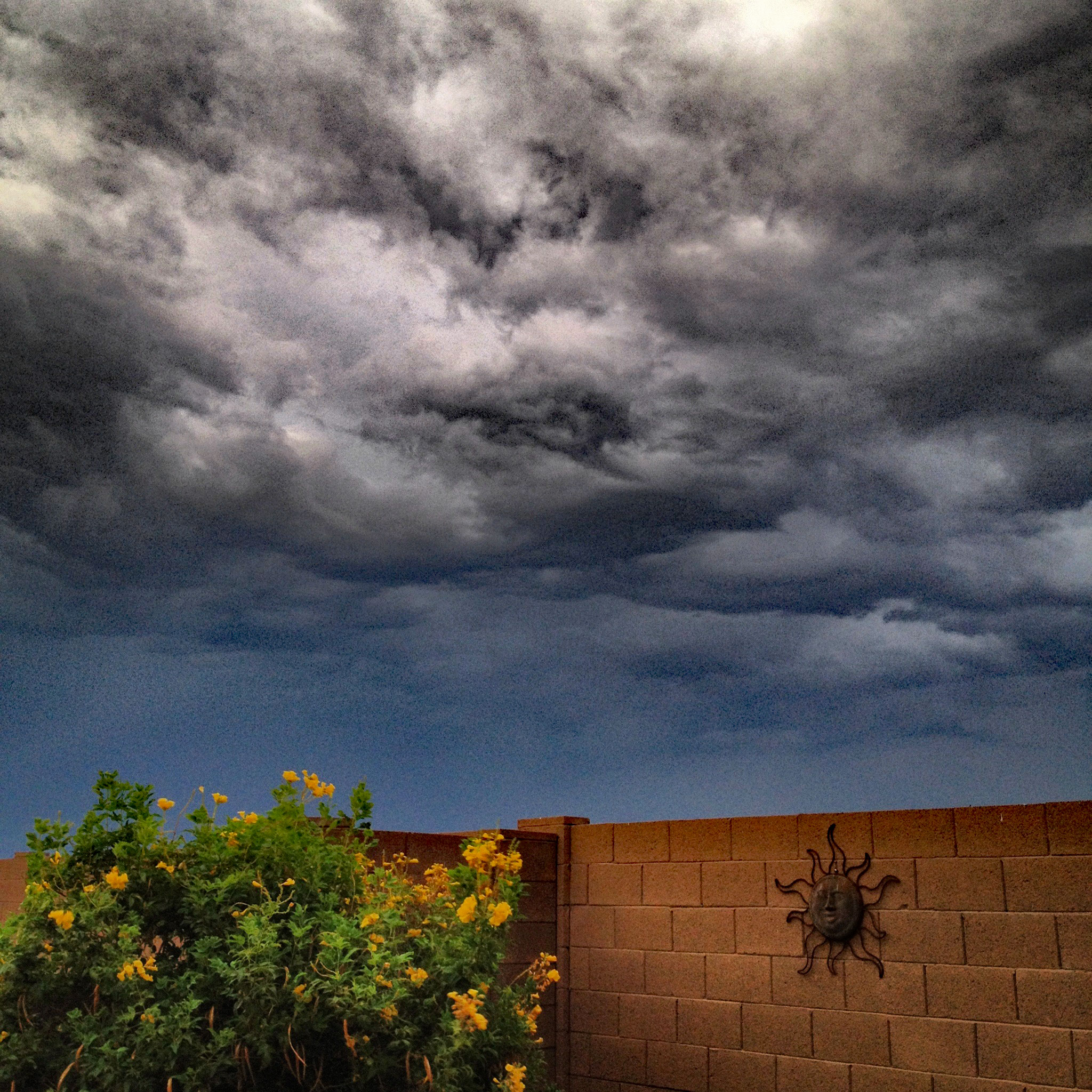 Storm-Clouds-Over-The-Fence.jpg