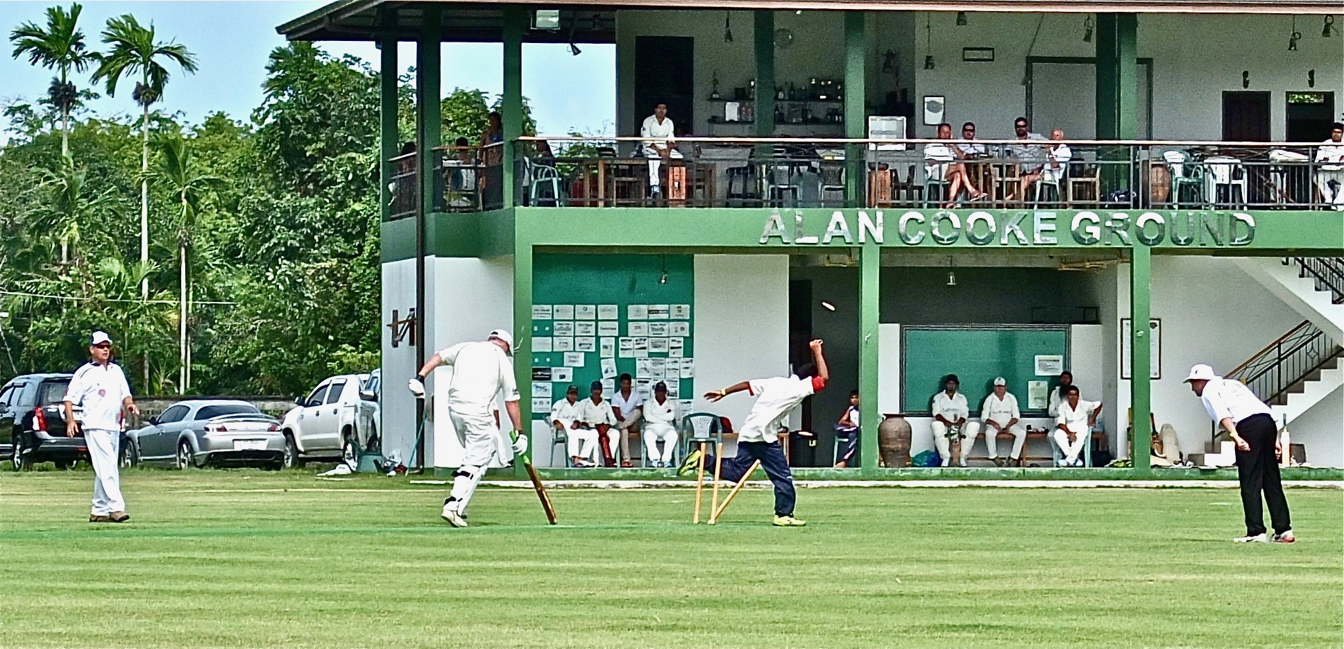 Thai lad, Karn (Village), sends the bails flying to end Damien Shaw's innings.jpg