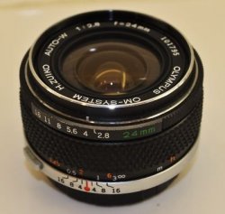 olympus-om-zuiko-24mm-wide-angle-lens-w-caps-case-nice_130470525235.jpg