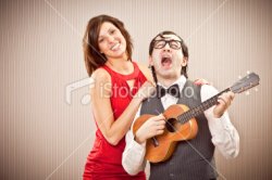 nerd in love with beautiful girl play a serenade song Royalty Free Stock Photo.jpeg