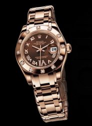 ladies rosegold rolex.jpg