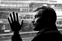 Sad-love-sad-boy-alone-man-alone-in-dark-black-room-looking-out-from-window1.jpg