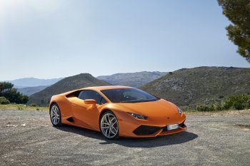 2015-lamborghini-huracan-lp-610-4-front-three-quarters-in-motion.jpg