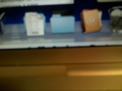 Menubar on bottom under dock.JPG