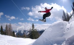 ist2_3121997_snowboarding_woman_in_mid_flight.jpg