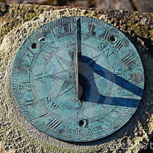 close-up-old-sundial-shadow-8333823-1.jpg