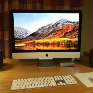 iMac with black HomePods.JPG