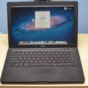 2008-apple-macbook-black-13-laptop_1_221feb6ab32d4c176c9f2551c37464d5.jpg