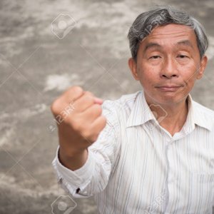 94573804-angry-hostile-aggressive-old-man-senior-man-clenching-his-fist-ready-to-attack.jpg