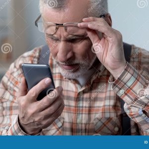 bewildered-old-man-looking-cellphone-new-technology-complicated-elderly-stock-photo-132356439-...jpg