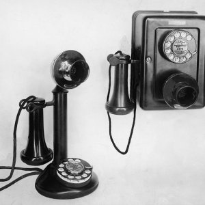 two-old-fashioned-telephones-authenticated-news.jpg