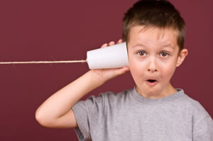 boy-with-plastic-cup-phone-on-ear.jpg