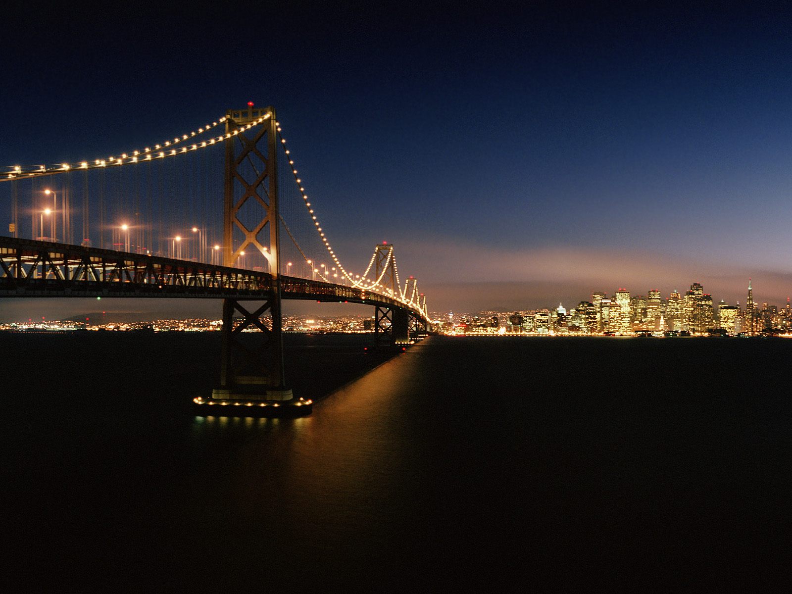 Evening_Crossing_Bay_Bridge_San_Francisco_California.jpg