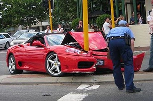 crashed-ferrari-pic-cen-602680668.jpg